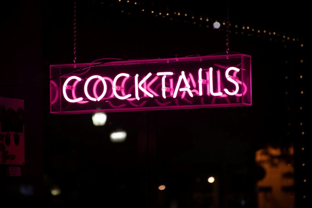 'Cocktails' signage in a club