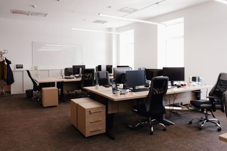 Interior of a modern office during after office hours in the concept of 'What Are Office Removals Services in Greenwich'.